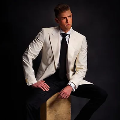 The White Whale: Ultimate luxury, a double-breasted white on white tuxedo jacket.